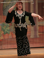 Latifa performs a cane dance at Rakkasah West in March 2007